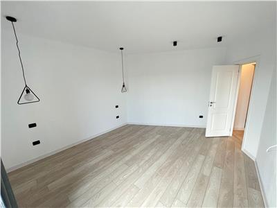 Casa parter, doua dormitoare , living cu bucatarie, baie, terasa, acces piscina