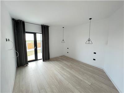 Casa parter, doua dormitoare , living cu bucatarie, baie, terasa, acces piscina