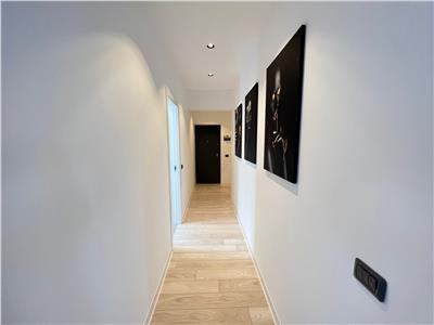 Casa parter, doua dormitoare , living cu bucatarie, baie, terasa, acces piscina